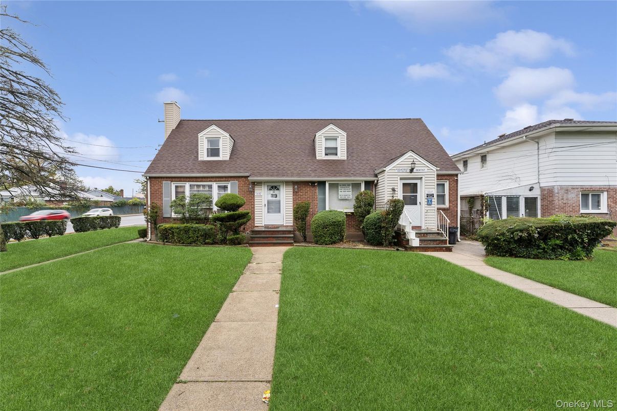 Exterior, Facade, Brick Facade, Cape Cod