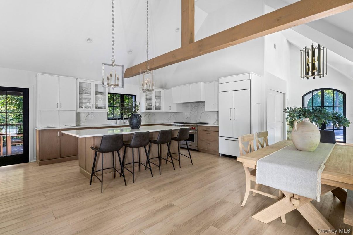 Dining room, Interior, Kitchen, Marble Walls, Pendant Lights, Stainless Steel Appliances, Wooden Beams, Wood Texture Flooring