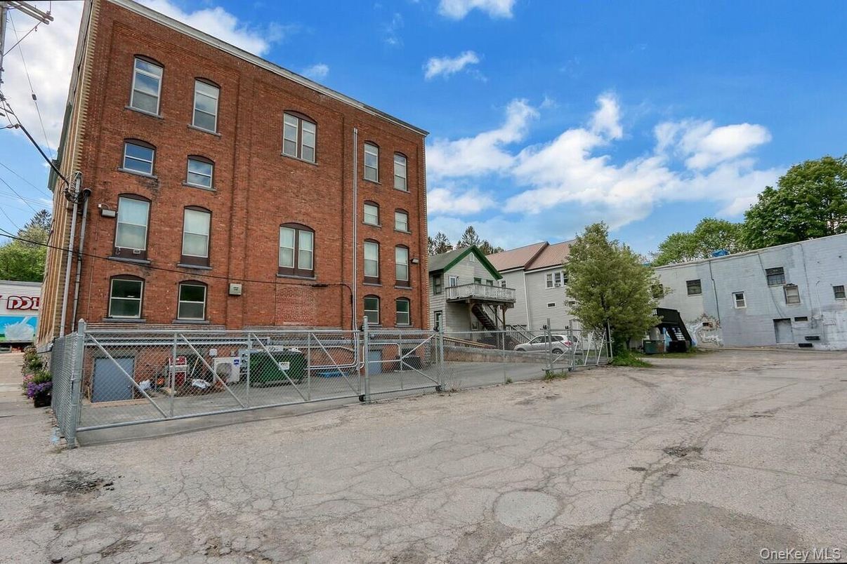Exterior, Facade, Brick Facade, Condo Building