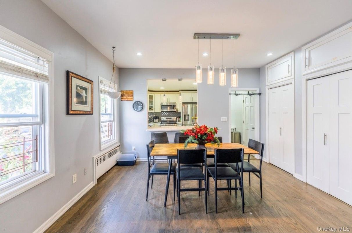 Dining room, Interior, Kitchen, Pendant Lights, Recessed Lighting, Stainless Steel Appliances, Wood Texture Flooring