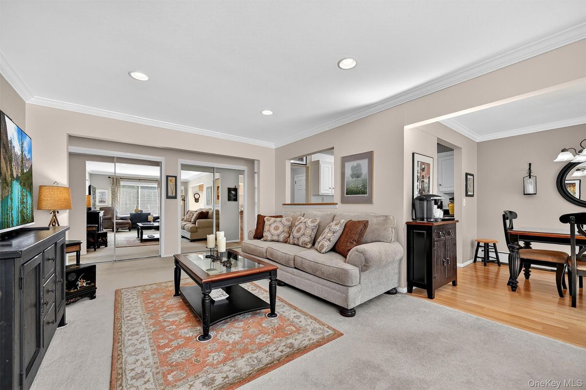 Dining room, Fireplace, Interior, Living room, Recessed Lighting, Wood Texture Flooring