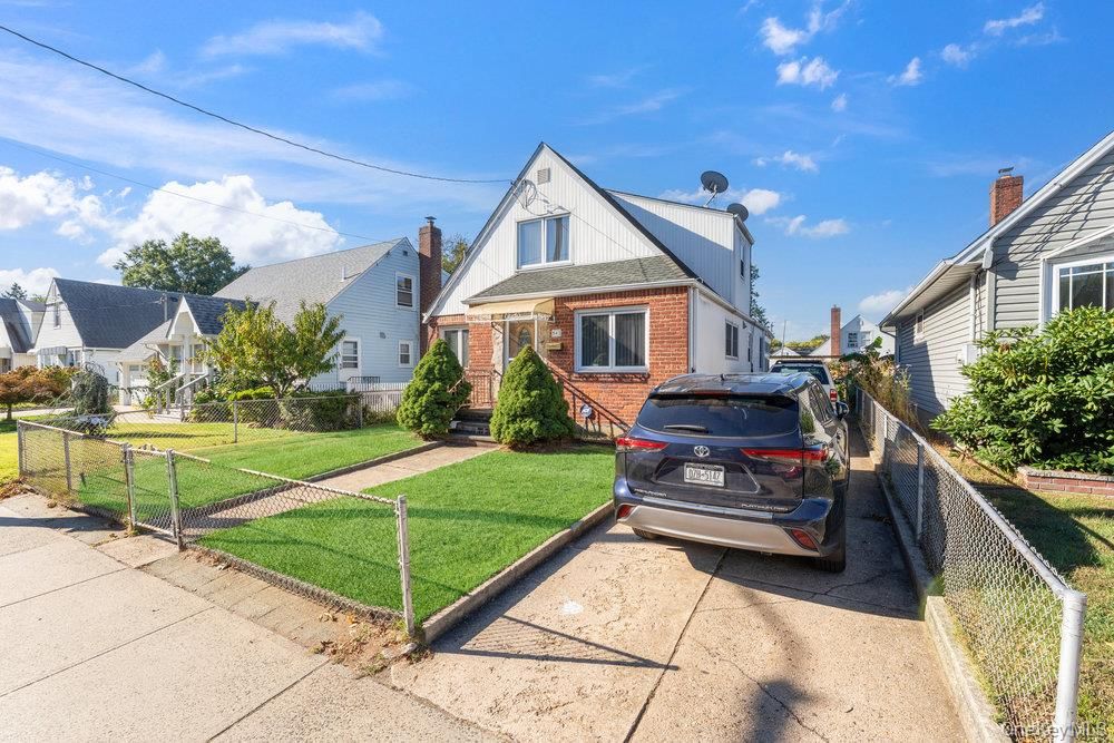 Exterior, Facade, Brick Facade, Cape Cod