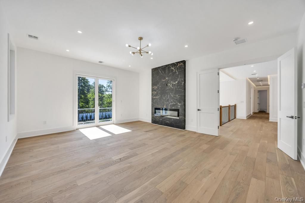 Empty room, Fireplace, Interior, Pendant Lights, Recessed Lighting, Wood Texture Flooring