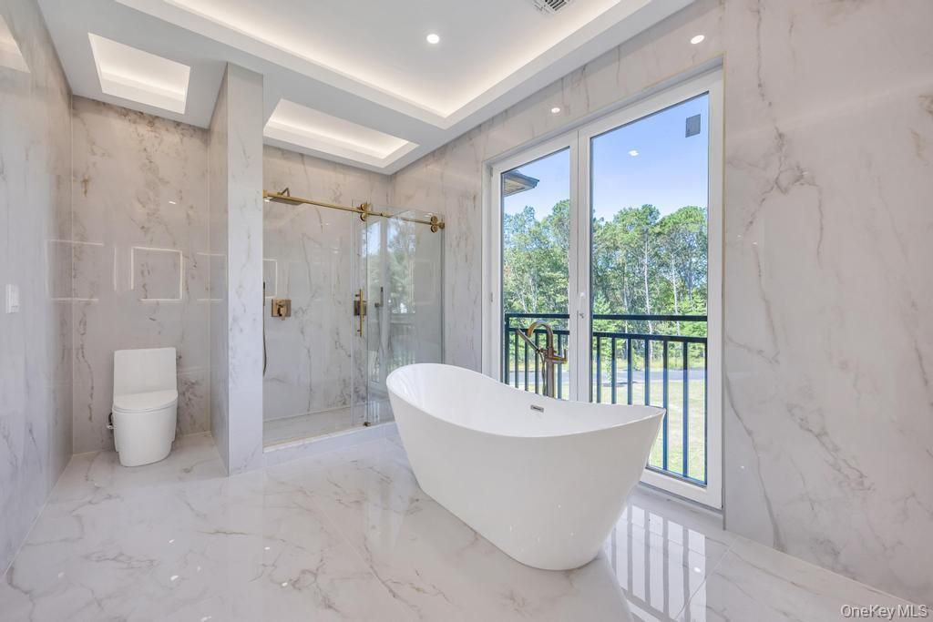 Bathroom, Free Standing Baths, Glass Shower, Interior, Marble, Marble Walls, Recessed Lighting