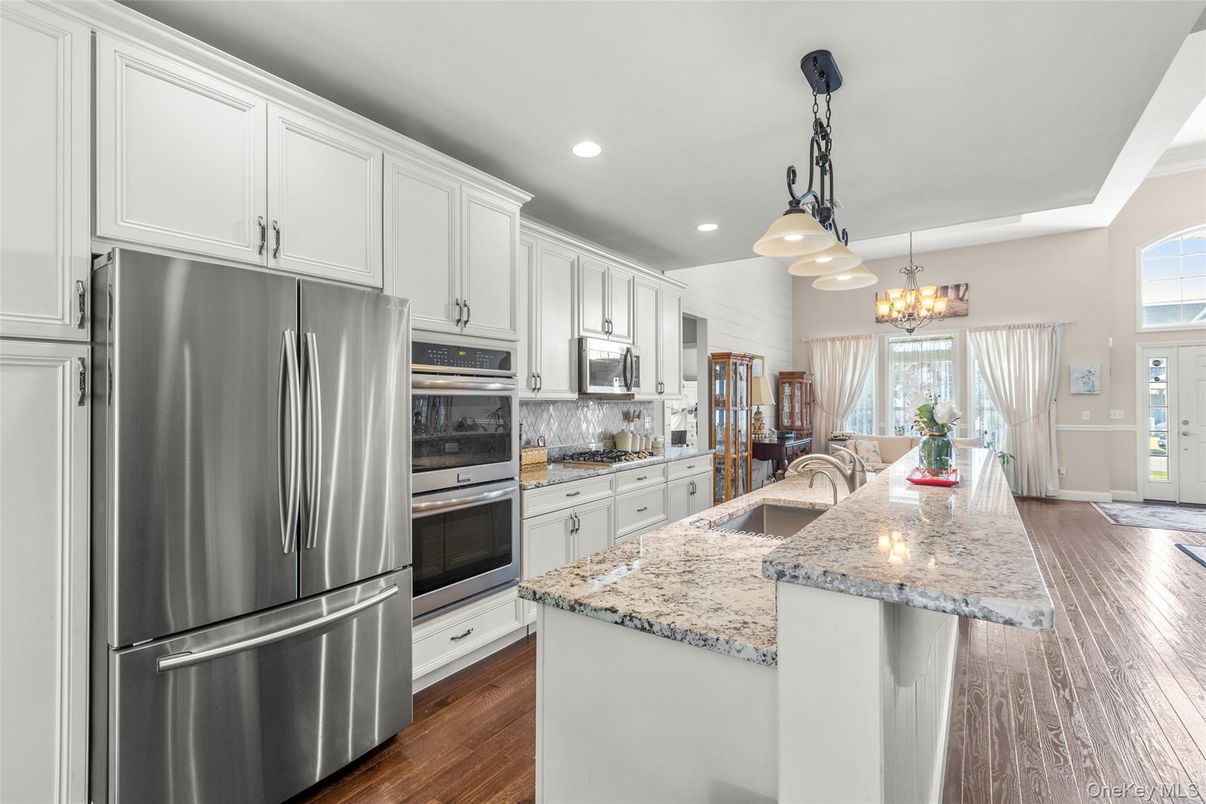 Chandelier, Interior, Kitchen, Pendant Lights, Recessed Lighting, Stainless Steel Appliances, Wood Texture Flooring