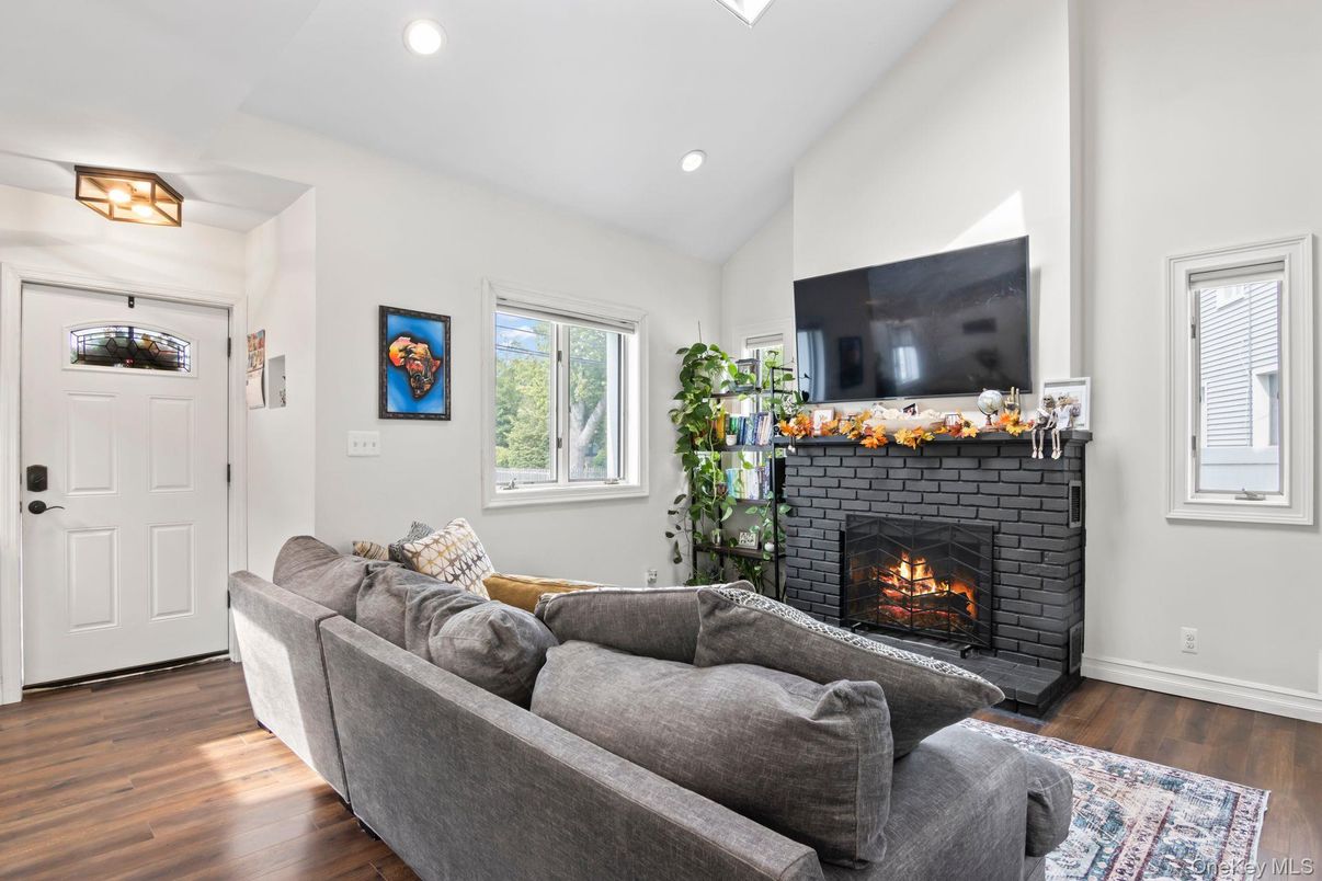 Fireplace, Interior, Living room, Recessed Lighting, Wood Texture Flooring