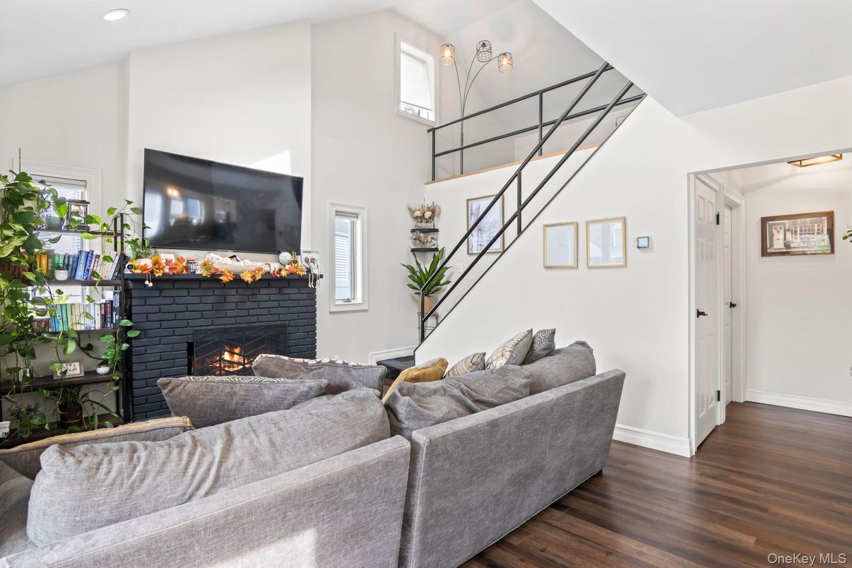 Fireplace, Interior, Living room, Recessed Lighting, Wood Texture Flooring