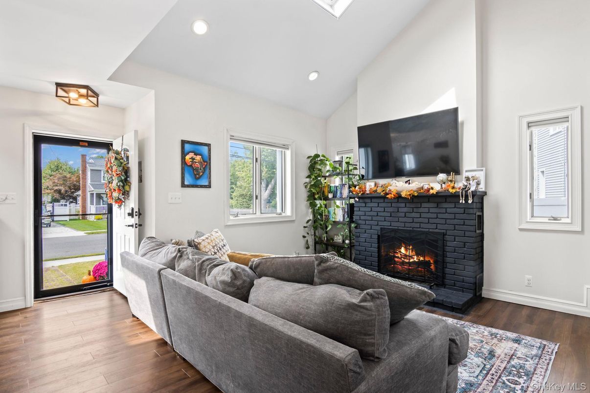 Fireplace, Interior, Living room, Recessed Lighting, Wood Texture Flooring