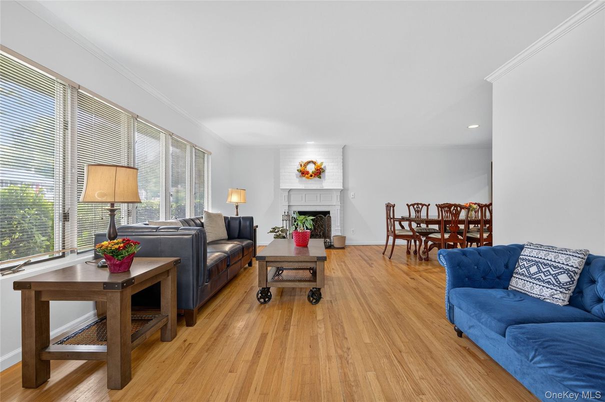 Dining room, Fireplace, Interior, Living room, Recessed Lighting, Wood Texture Flooring
