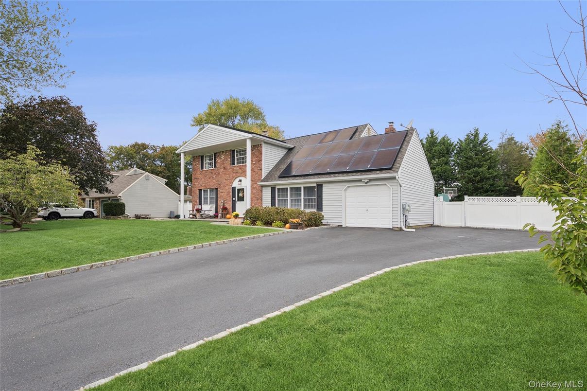 Attached, Exterior, Facade, Brick Facade, Solar Panels, Cape Cod
