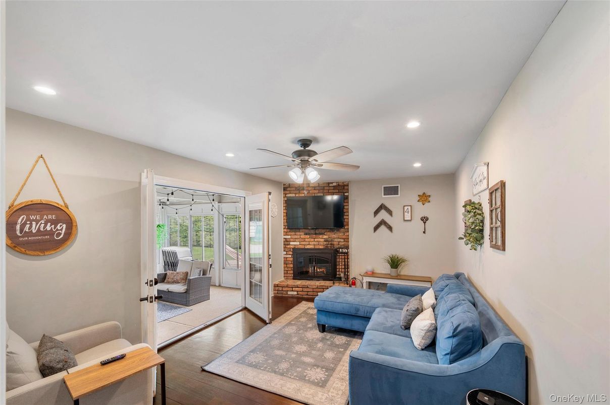 Fireplace, Interior, Living room, Recessed Lighting, Wood Texture Flooring