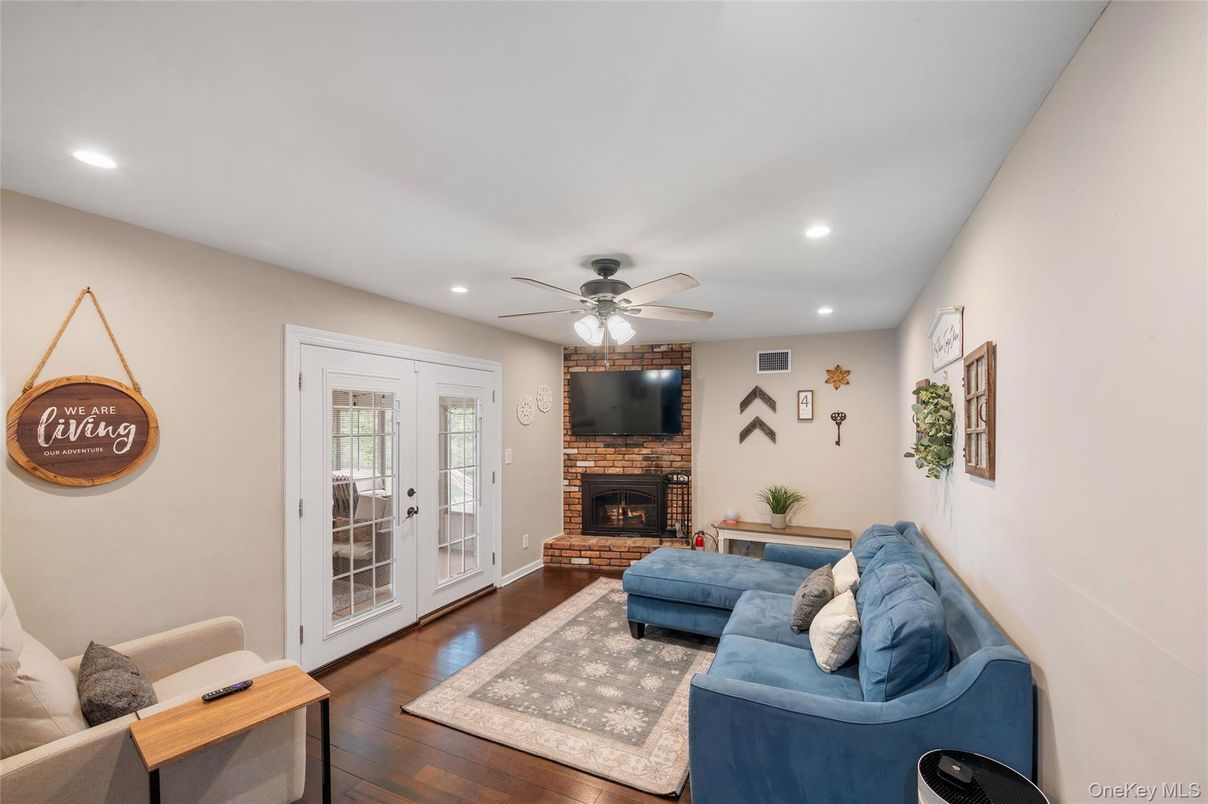Fireplace, Interior, Living room, Recessed Lighting, Wood Texture Flooring
