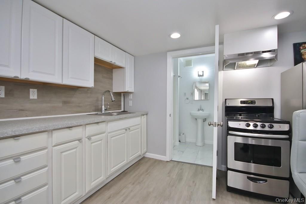 Interior, Kitchen, Marble, Recessed Lighting, Stainless Steel Appliances, Wood Texture Flooring