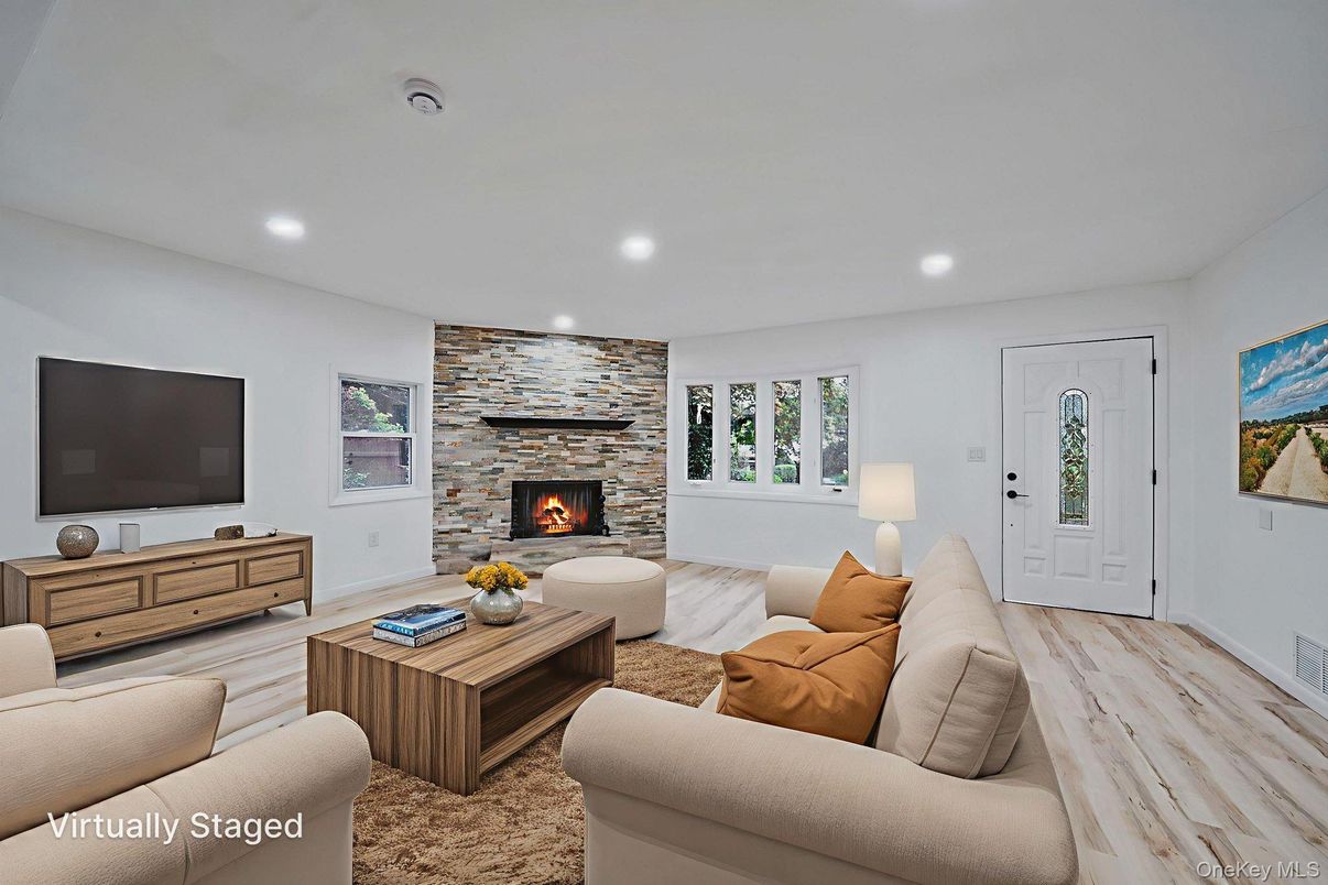 Fireplace, Interior, Living room, Recessed Lighting, Stone Walls, Wood Texture Flooring