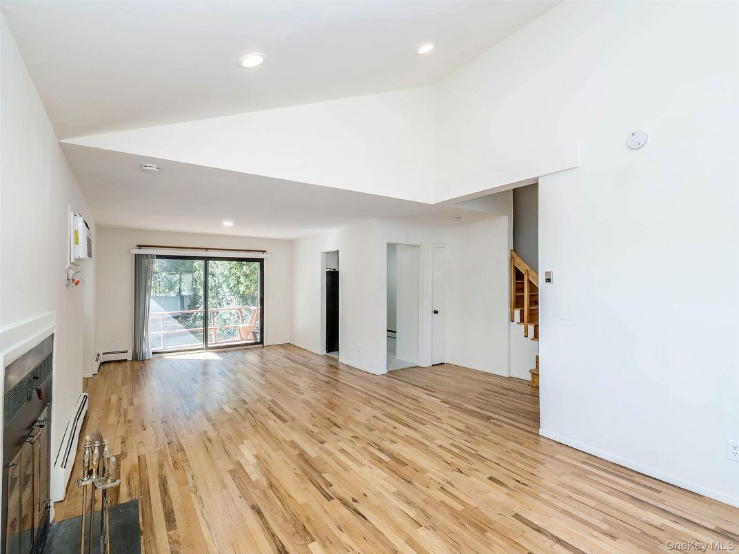 Empty room, Fireplace, Interior, Recessed Lighting, Wood Texture Flooring