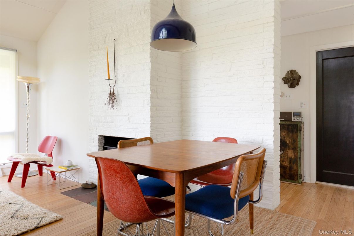 Dining room, Fireplace, Interior, Stone Walls, Wood Texture Flooring