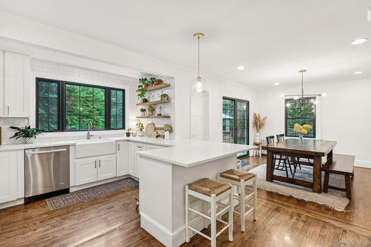 Dining room, Interior, Kitchen, Pendant Lights, Recessed Lighting, Stainless Steel Appliances, Wood Texture Flooring