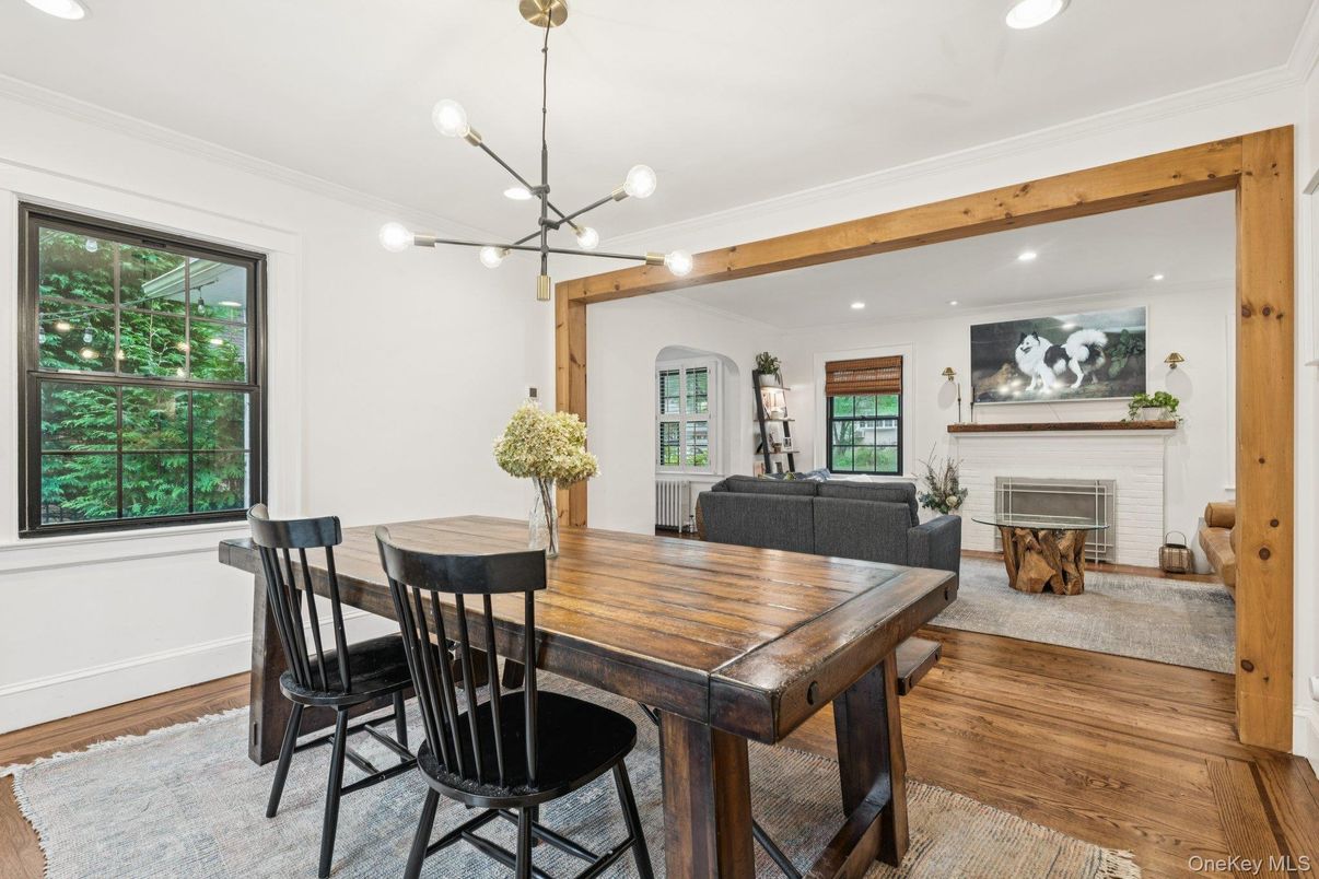 Dining room, Fireplace, Interior, Pendant Lights, Recessed Lighting, Wooden Beams, Wood Texture Flooring