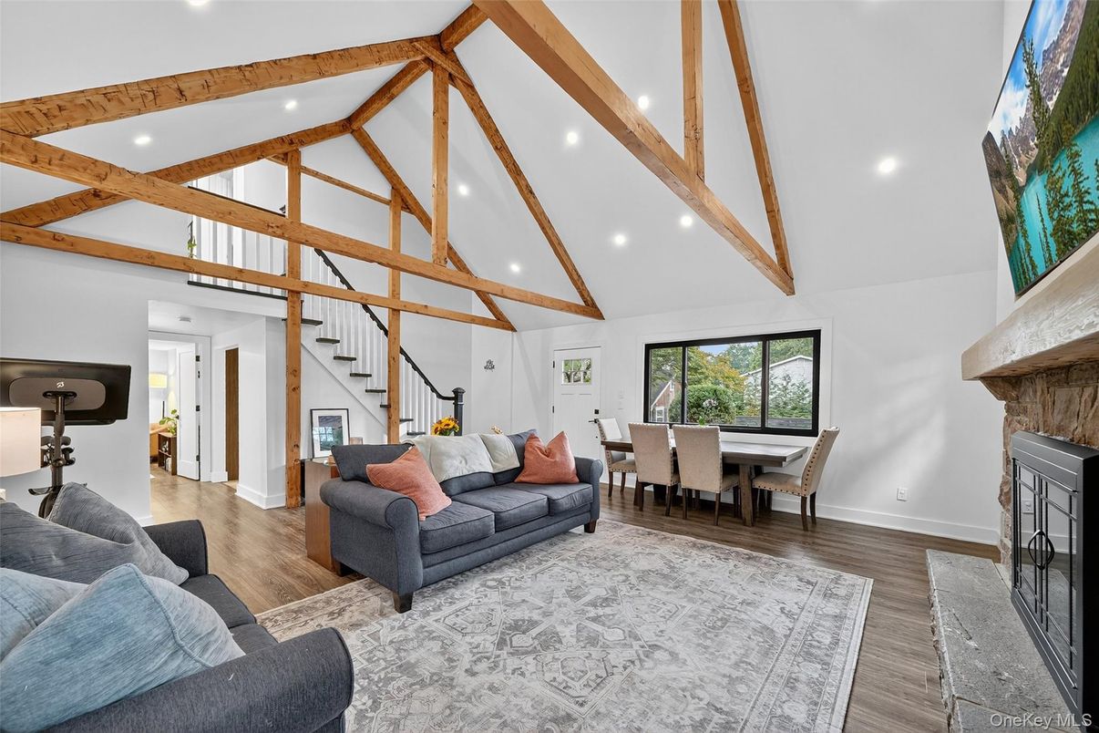 Dining room, Fireplace, Interior, Living room, Recessed Lighting, Wooden Beams, Wood Texture Flooring