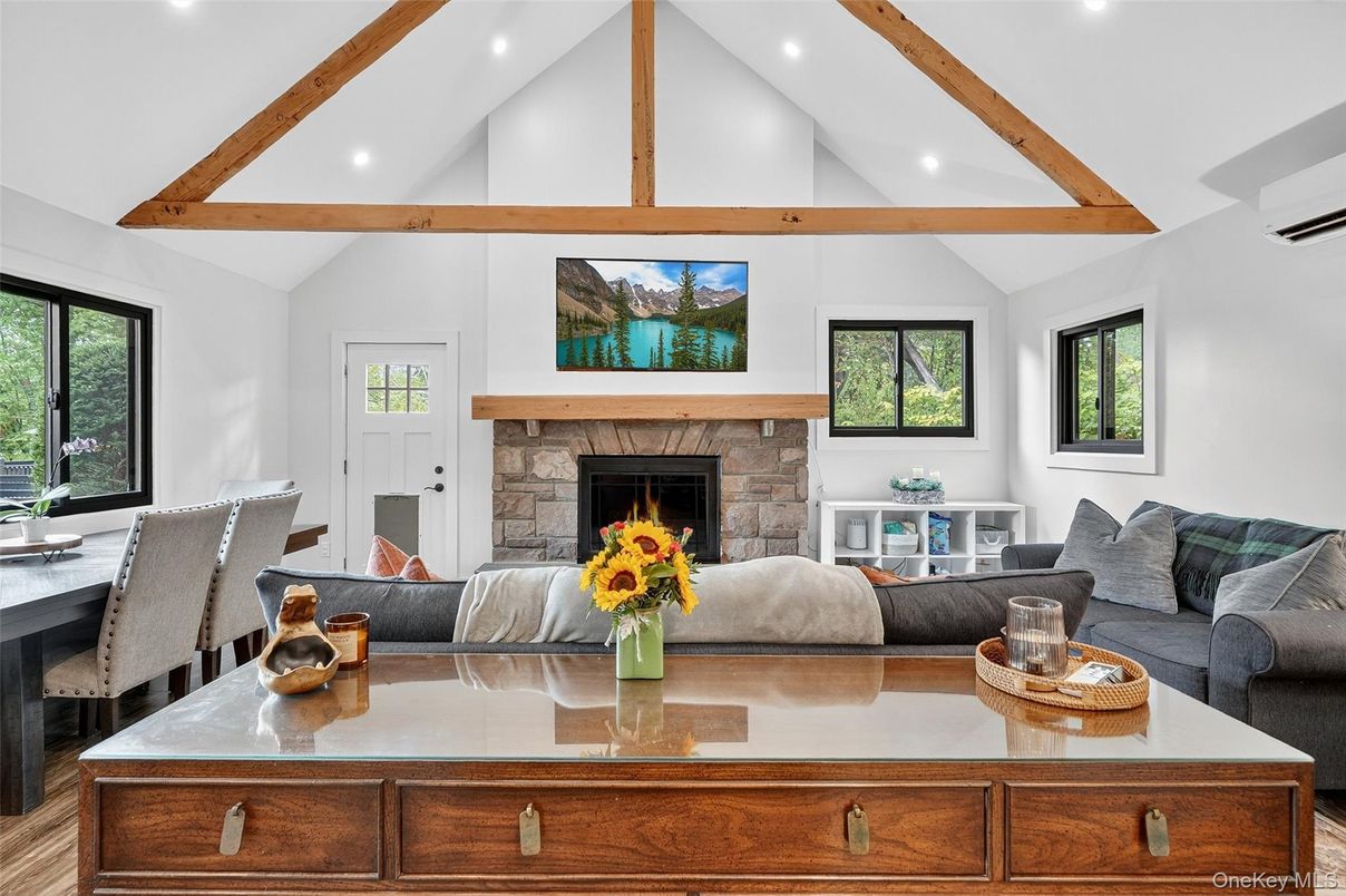 Dining room, Fireplace, Interior, Living room, Recessed Lighting, Wooden Beams, Wood Texture Flooring