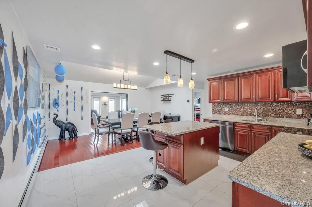 Chandelier, Dining room, Interior, Kitchen, Pendant Lights, Recessed Lighting, Stainless Steel Appliances, Wood Texture Flooring