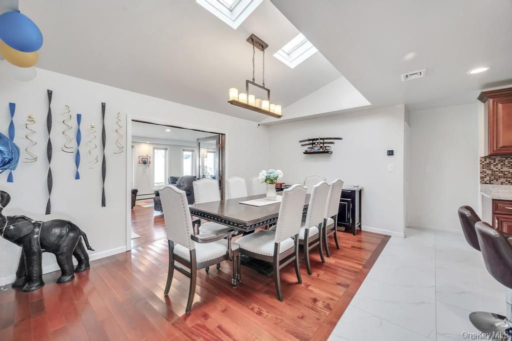 Chandelier, Dining room, Interior, Marble, Pendant Lights, Recessed Lighting, Wood Texture Flooring