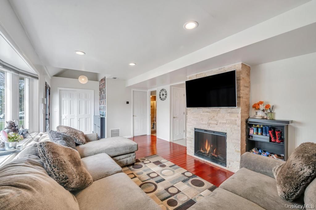 Fireplace, Interior, Living room, Recessed Lighting, Wood Texture Flooring