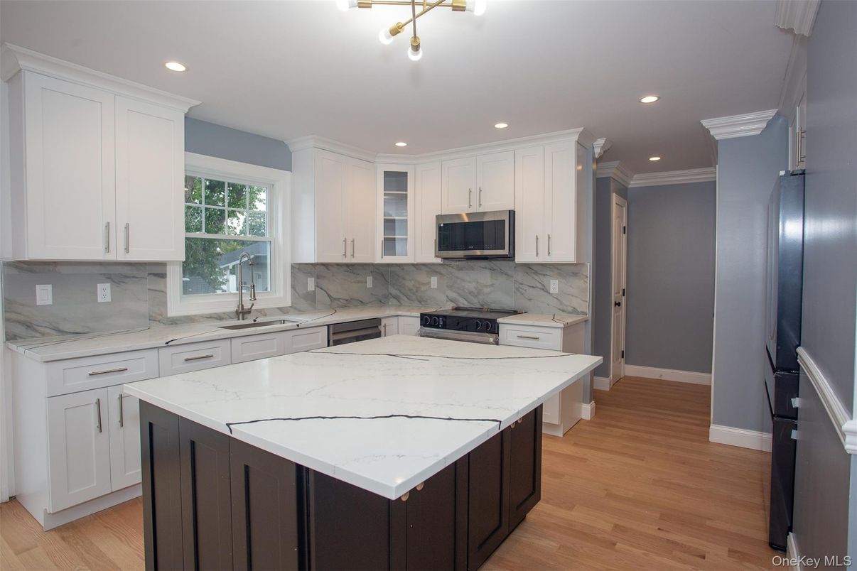 Interior, Kitchen, Marble Walls, Recessed Lighting, Wood Texture Flooring