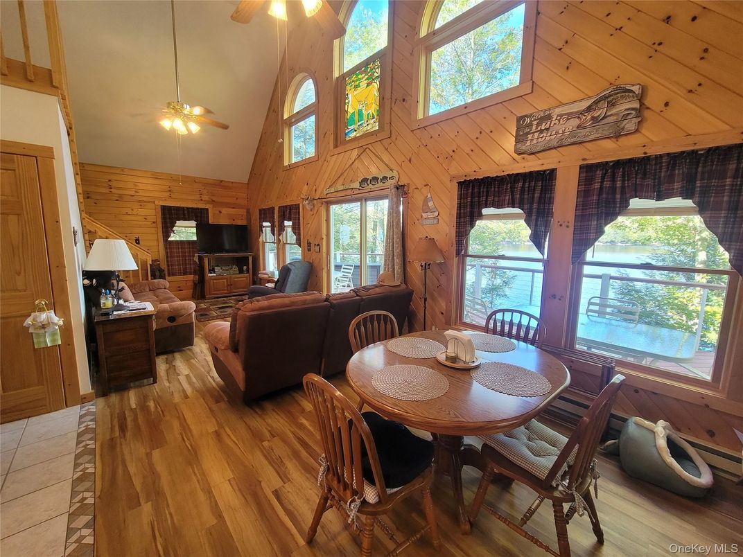 Dining room, Fireplace, Interior, Living room, Wood Texture Flooring, Wooden Walls