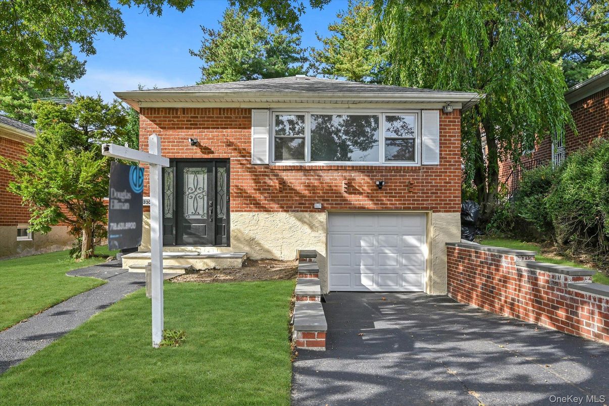 Attached, Exterior, Facade, Brick Facade, Raised Ranch