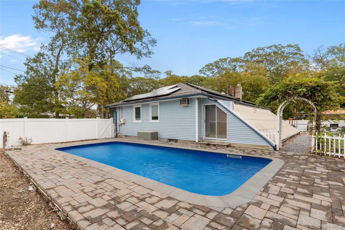 Exterior, Pool, Solar Panels