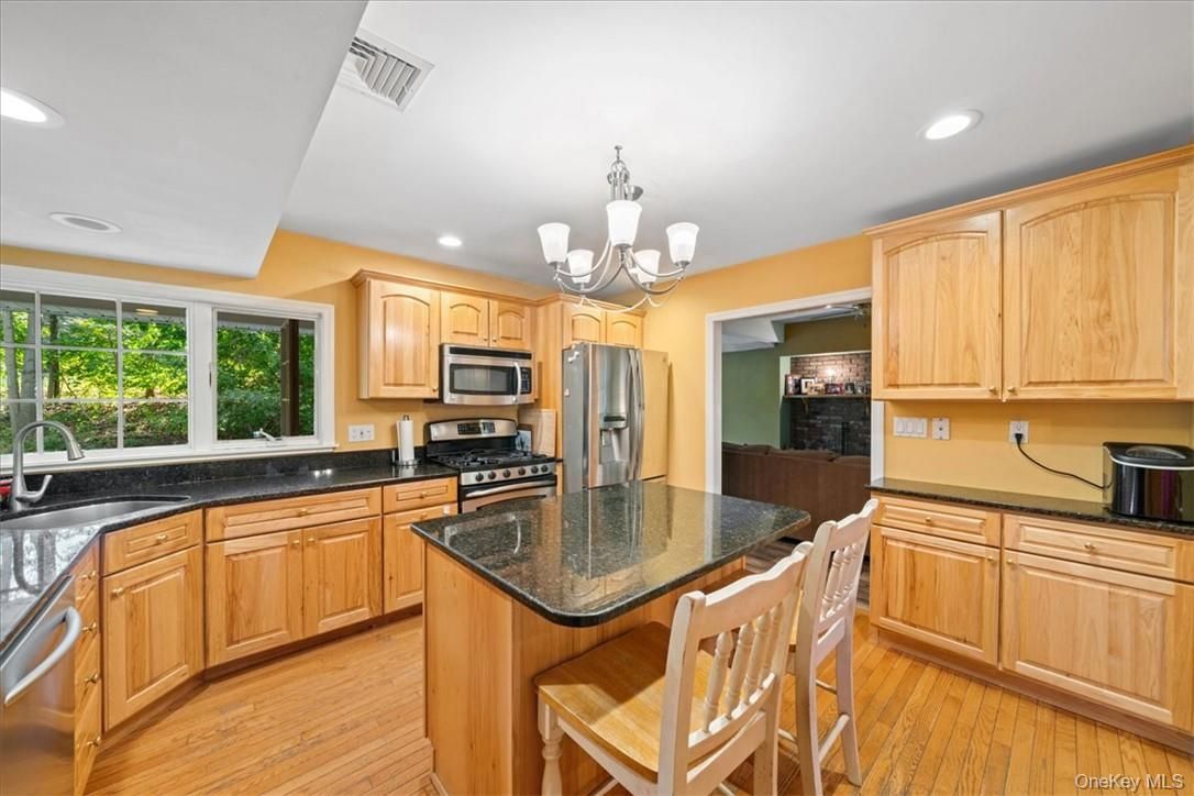 Chandelier, Interior, Kitchen, Recessed Lighting, Stainless Steel Appliances, Wood Texture Flooring