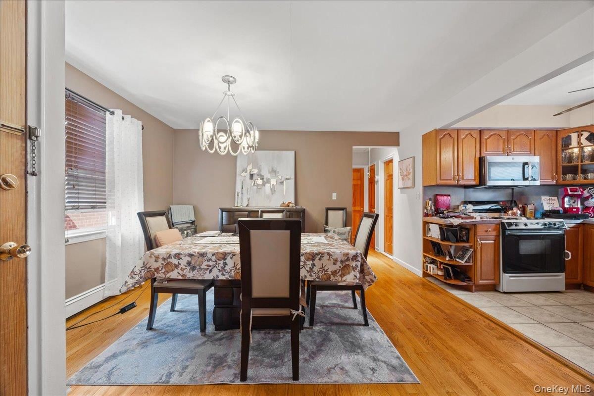 Chandelier, Dining room, Interior, Kitchen, Pendant Lights, Wood Texture Flooring