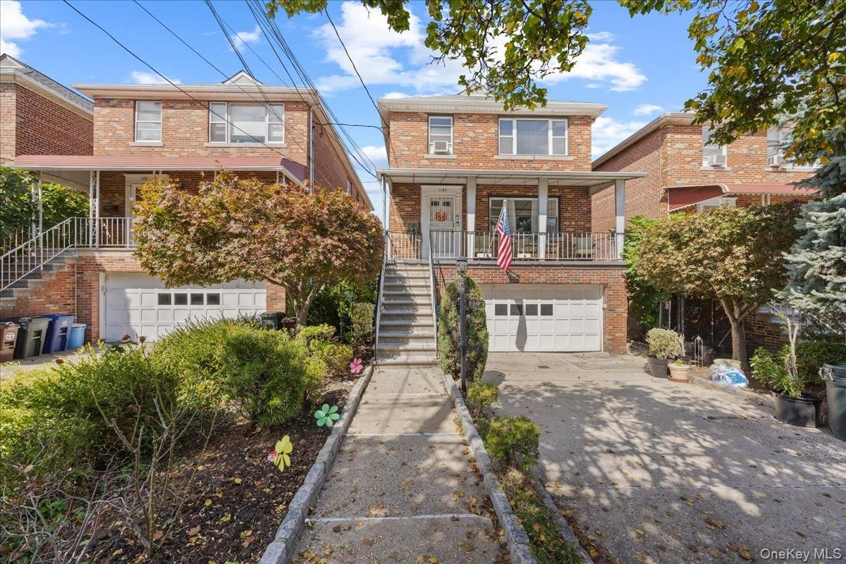 Attached, Exterior, Facade, Brick Facade, American Foursquare