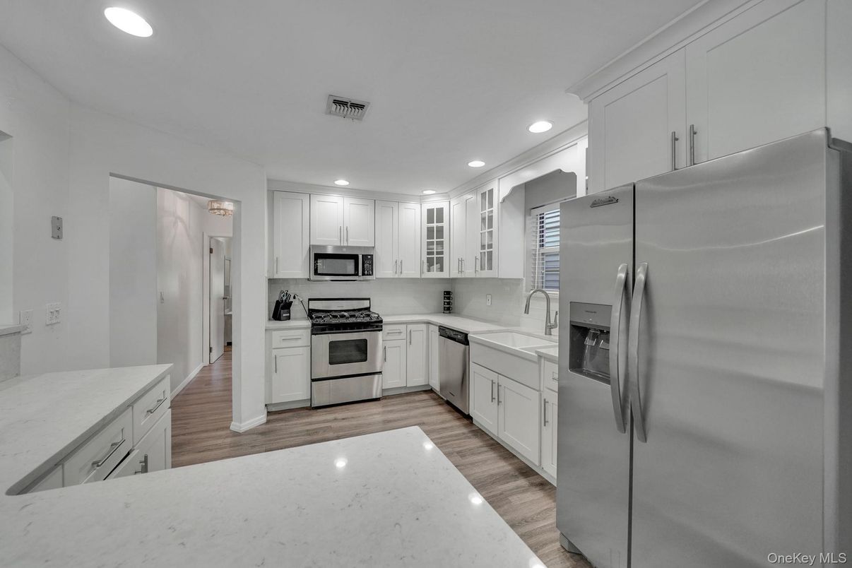 Interior, Kitchen, Recessed Lighting, Stainless Steel Appliances, Wood Texture Flooring