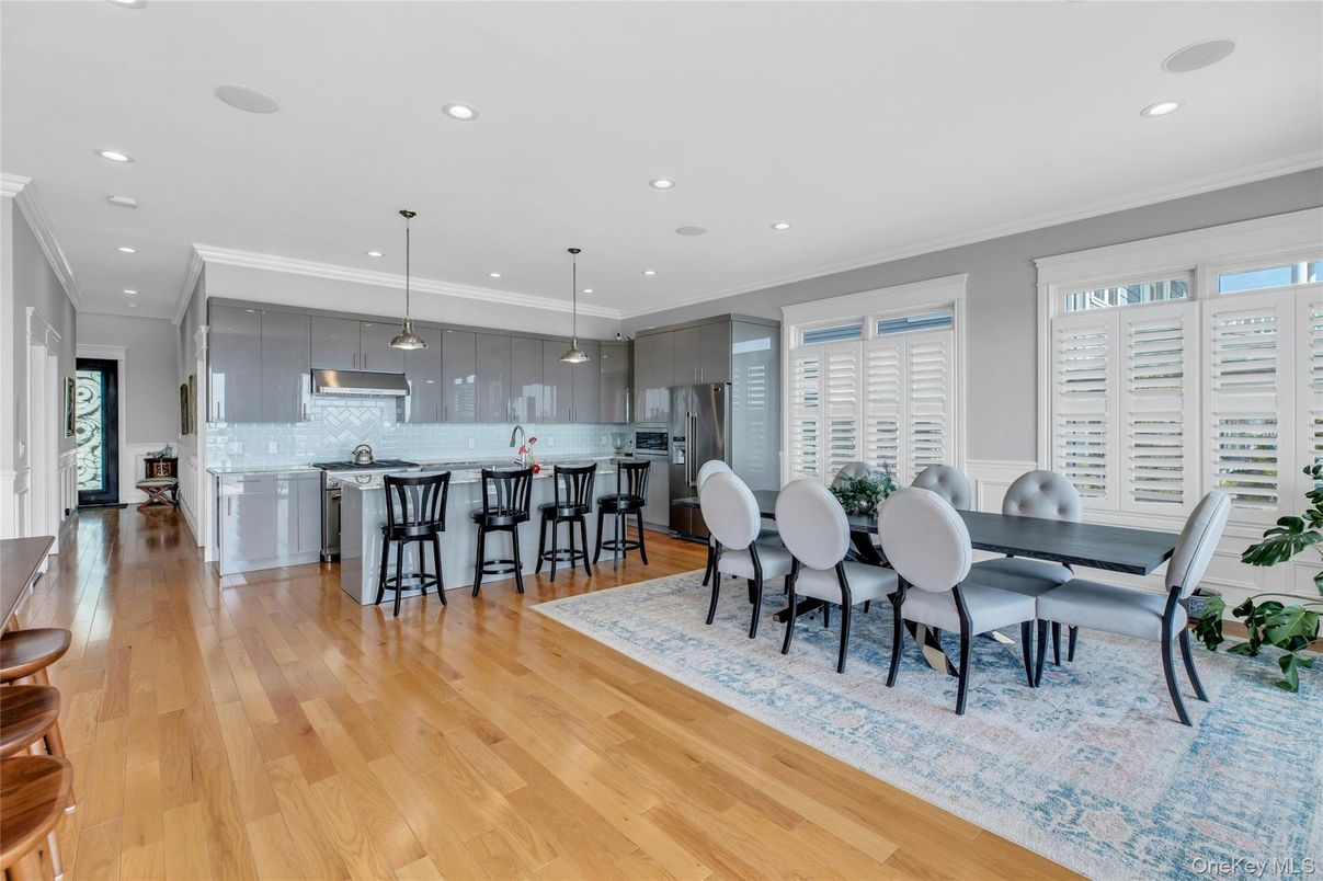 Dining room, Interior, Kitchen, Pendant Lights, Recessed Lighting, Stainless Steel Appliances, Wood Texture Flooring