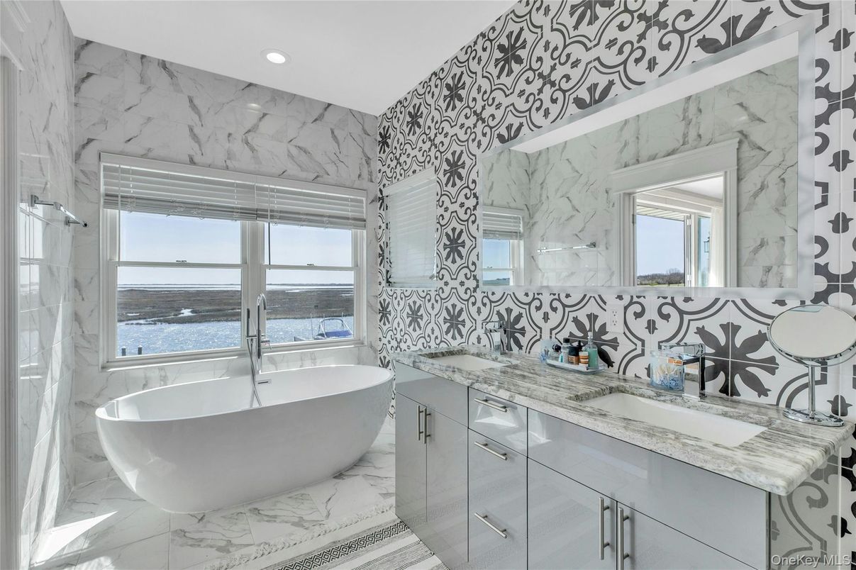 Bathroom, Dual Sink Vanities, Free Standing Baths, Interior, Marble, Marble Walls, Recessed Lighting, Water