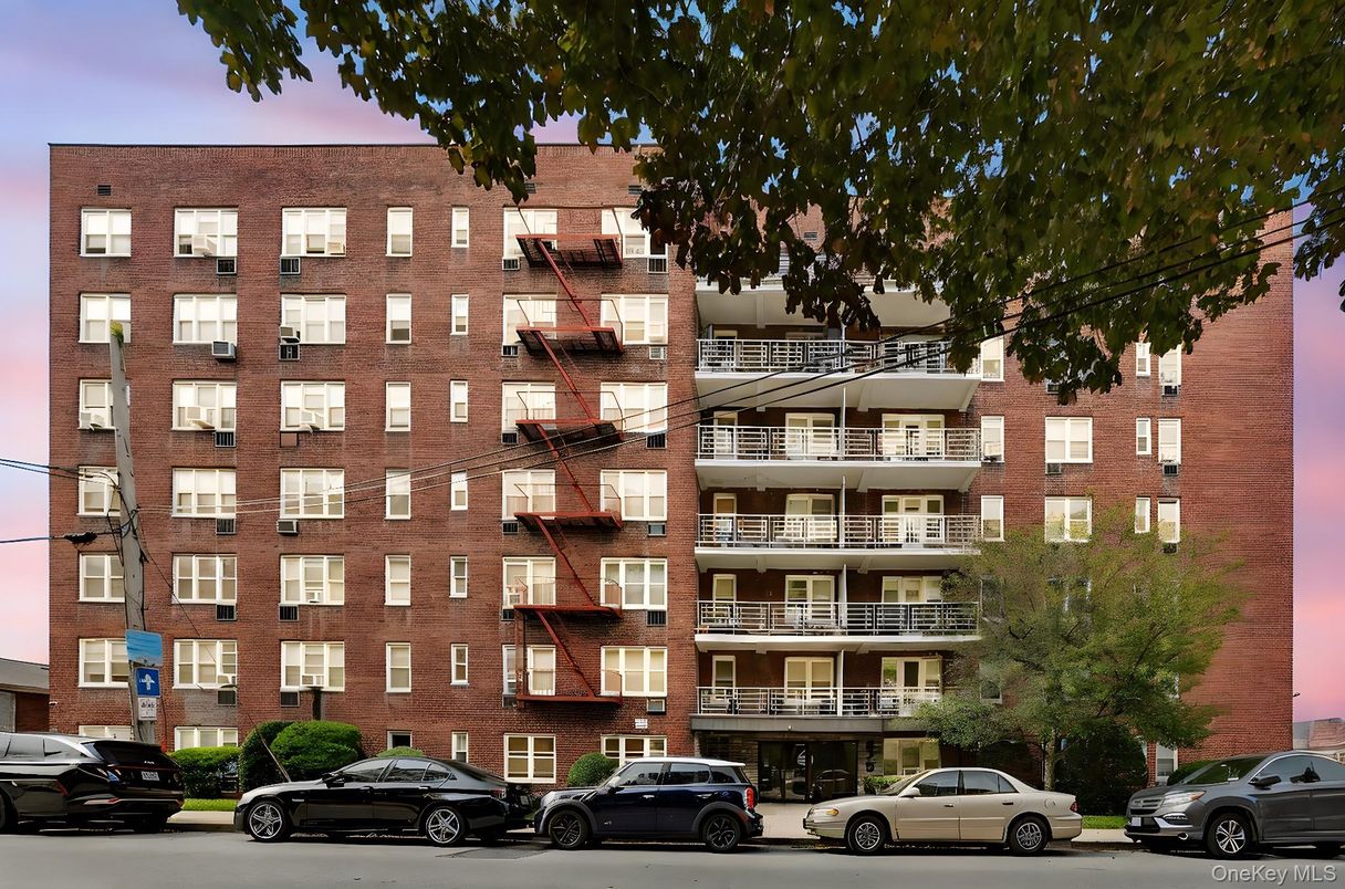 Exterior, Facade, Brick Facade, Condo Building
