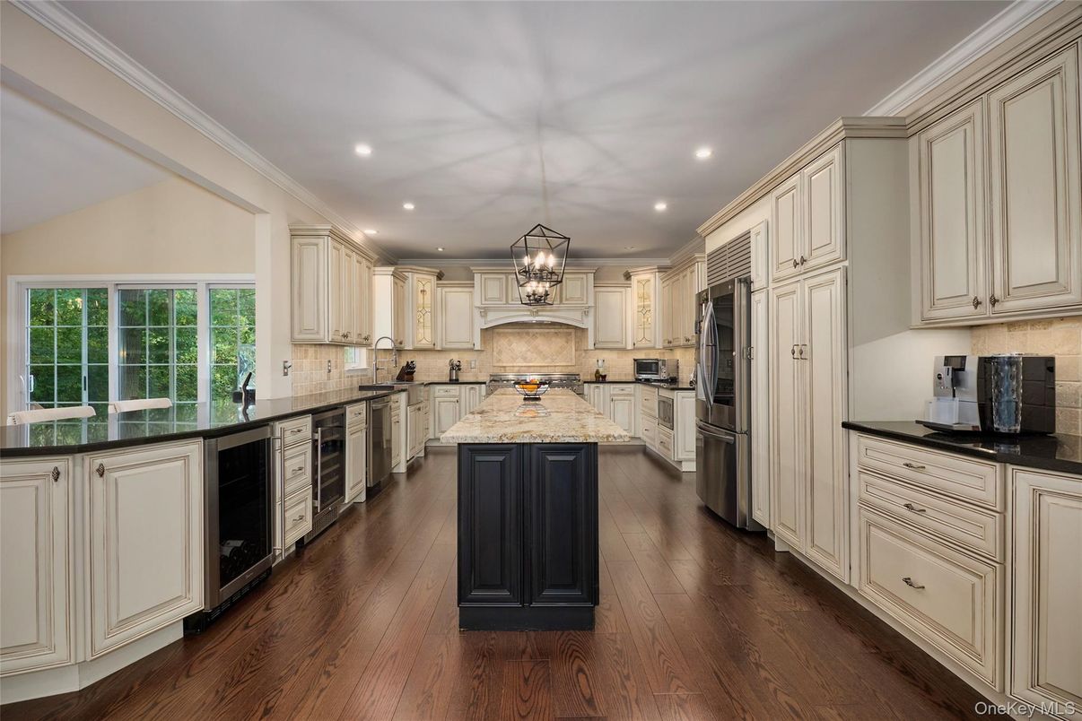 Chandelier, Interior, Kitchen, Pendant Lights, Recessed Lighting, Stainless Steel Appliances, Wood Texture Flooring