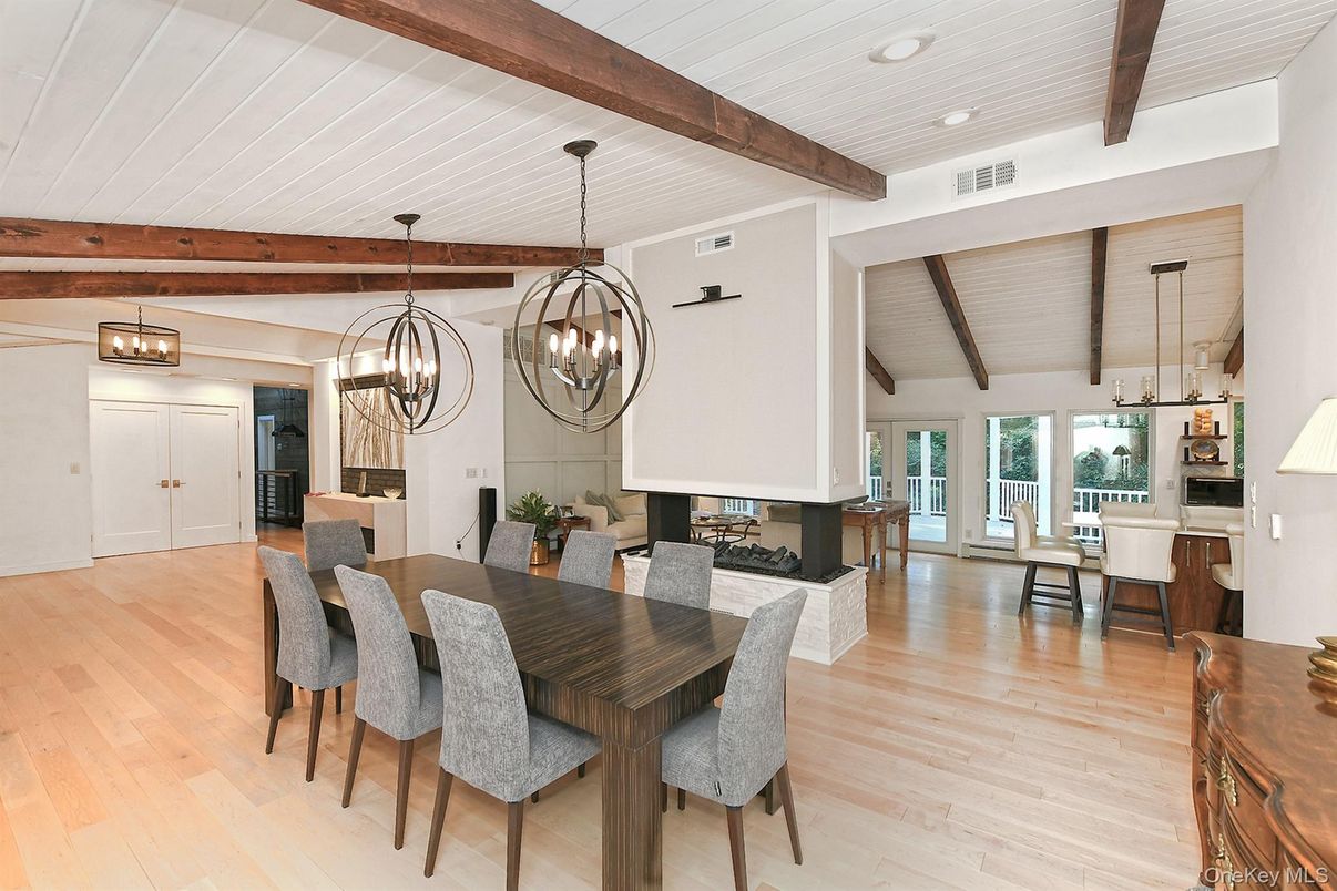 Chandelier, Dining room, Interior, Pendant Lights, Recessed Lighting, Wooden Beams, Wood Texture Flooring