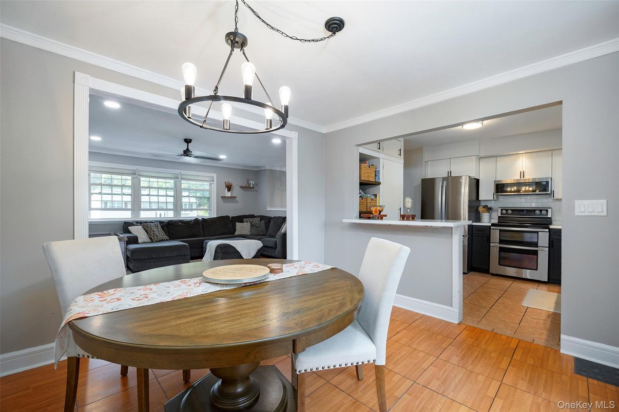 Dining room, Interior, Kitchen, Living room, Pendant Lights, Recessed Lighting, Stainless Steel Appliances, Wood Texture Flooring