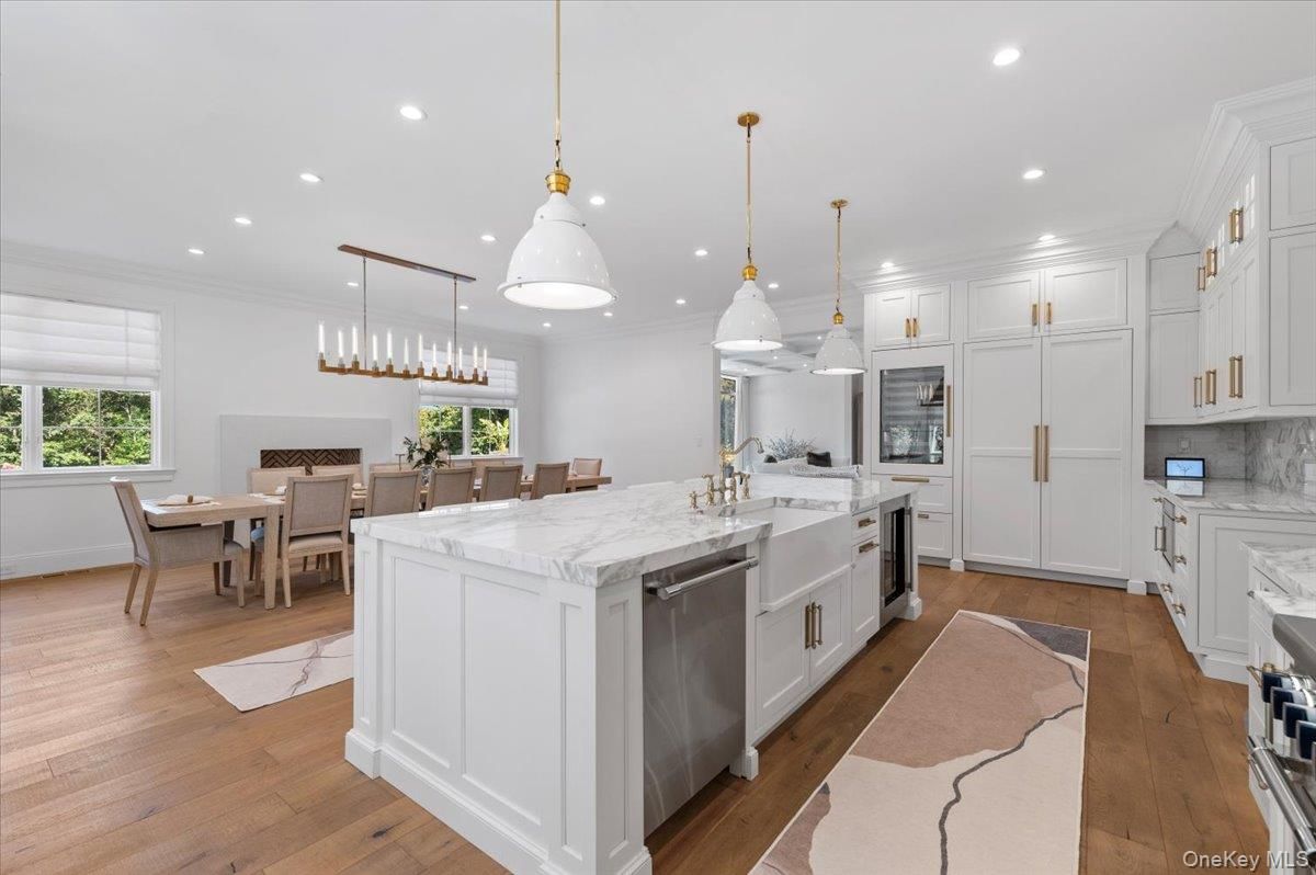 Dining room, Interior, Kitchen, Pendant Lights, Recessed Lighting, Stainless Steel Appliances, Wood Texture Flooring
