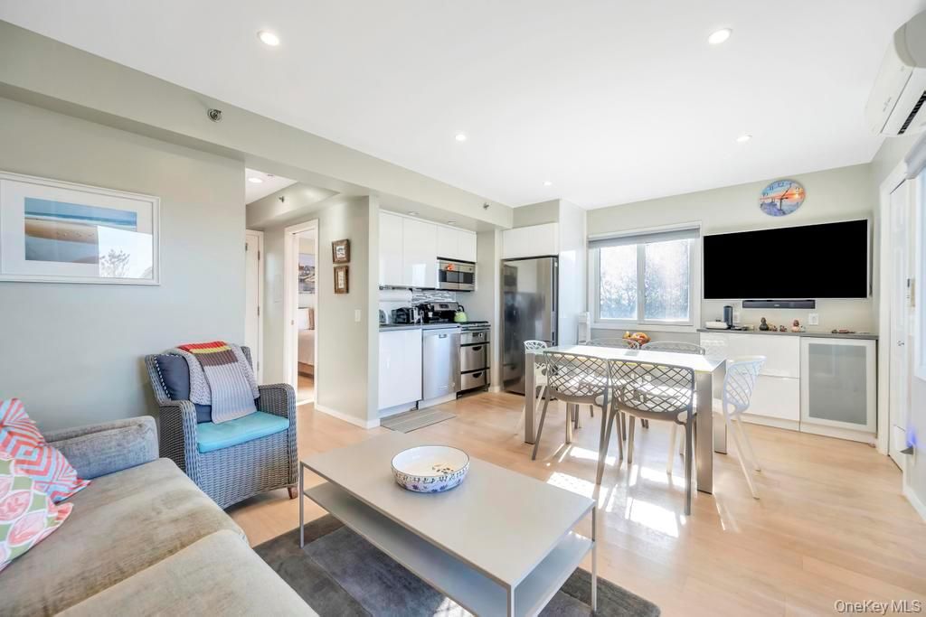 Dining room, Interior, Kitchen, Living room, Recessed Lighting, Stainless Steel Appliances, Wood Texture Flooring