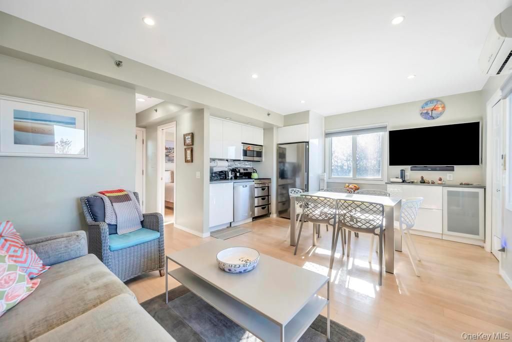 Dining room, Interior, Kitchen, Living room, Recessed Lighting, Stainless Steel Appliances, Wood Texture Flooring