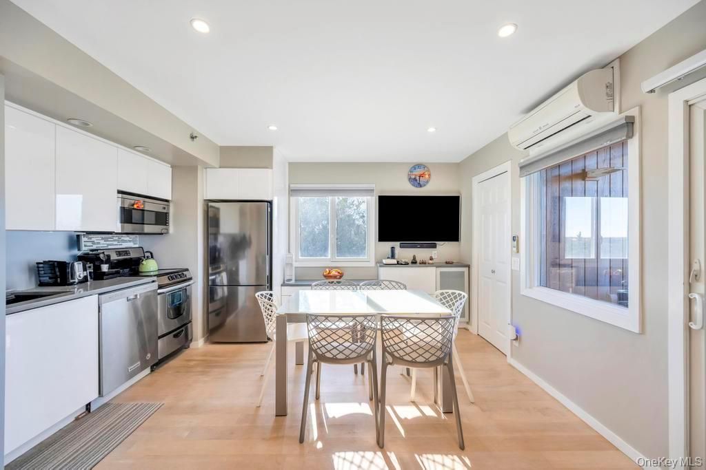 Dining room, Interior, Kitchen, Recessed Lighting, Stainless Steel Appliances, Wood Texture Flooring