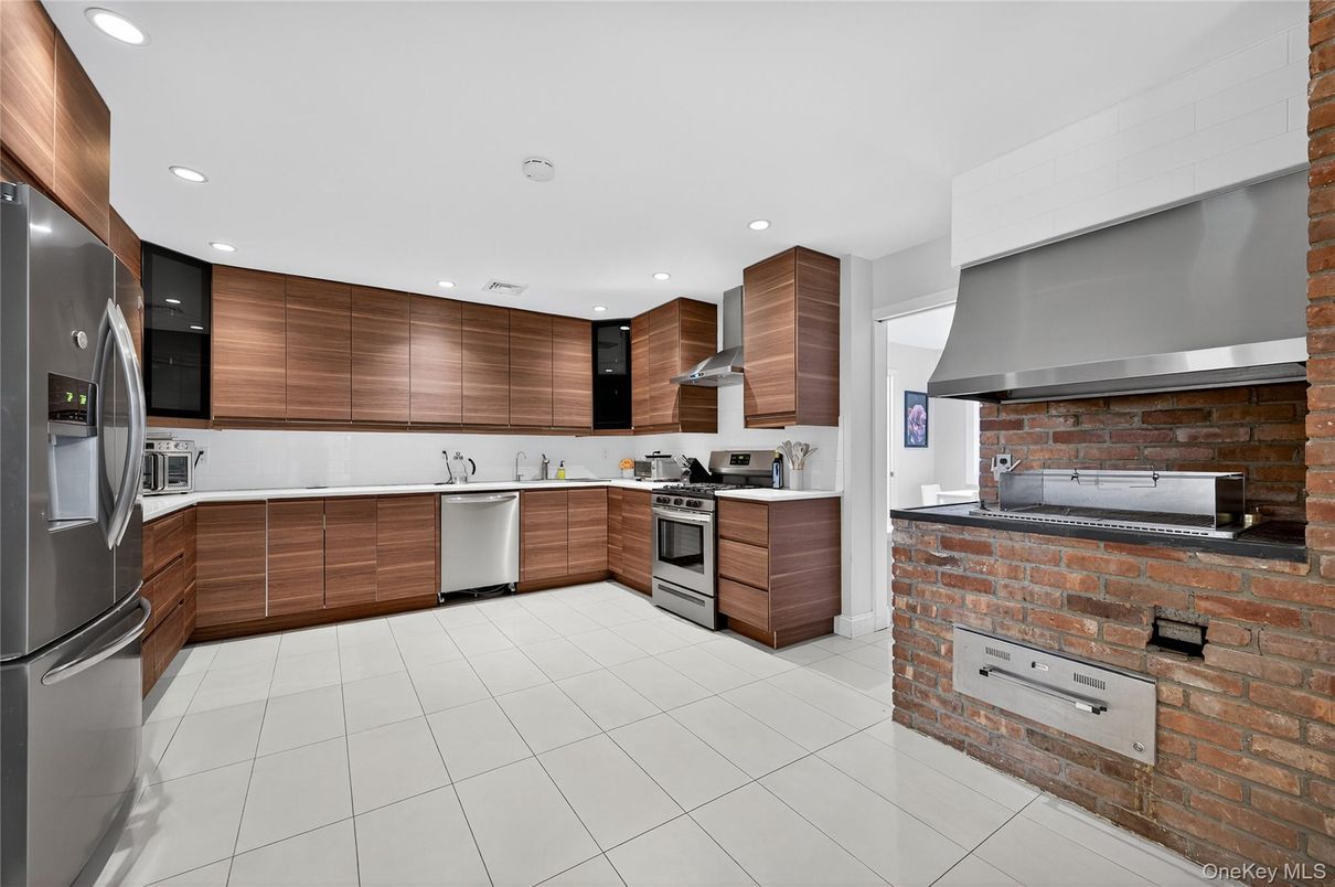 Interior, Kitchen, Recessed Lighting, Stainless Steel Appliances, Stone Walls
