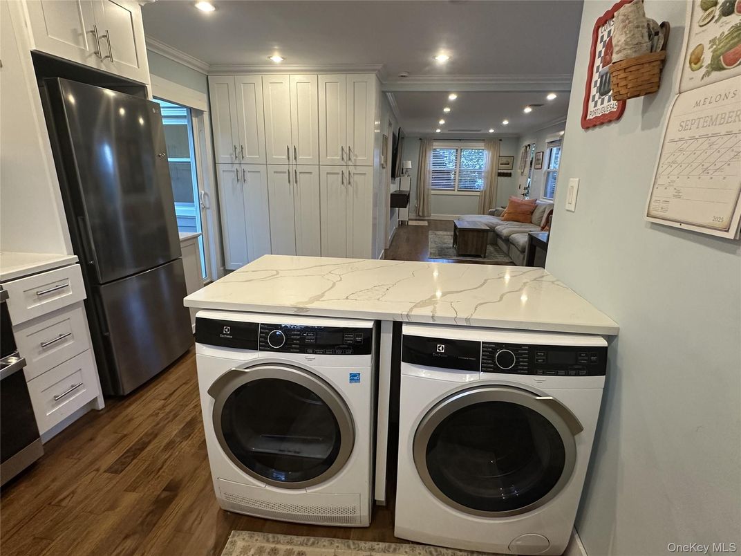 Interior, Kitchen, Recessed Lighting, Washer, Wood Texture Flooring