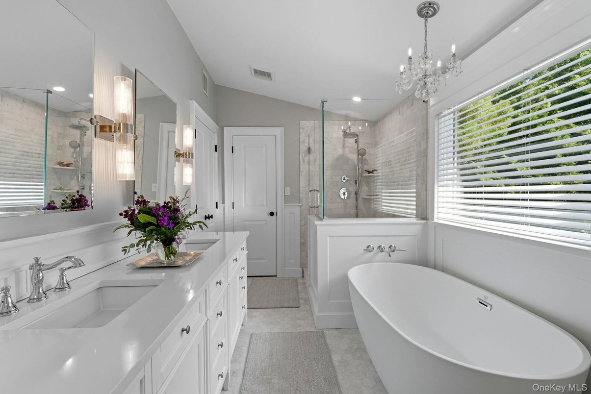Bathroom, Chandelier, Dual Sink Vanities, Free Standing Baths, Glass Shower, Interior, Pendant Lights, Recessed Lighting