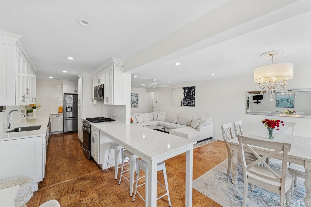 Chandelier, Dining room, Interior, Kitchen, Living room, Recessed Lighting, Stainless Steel Appliances, Wood Texture Flooring