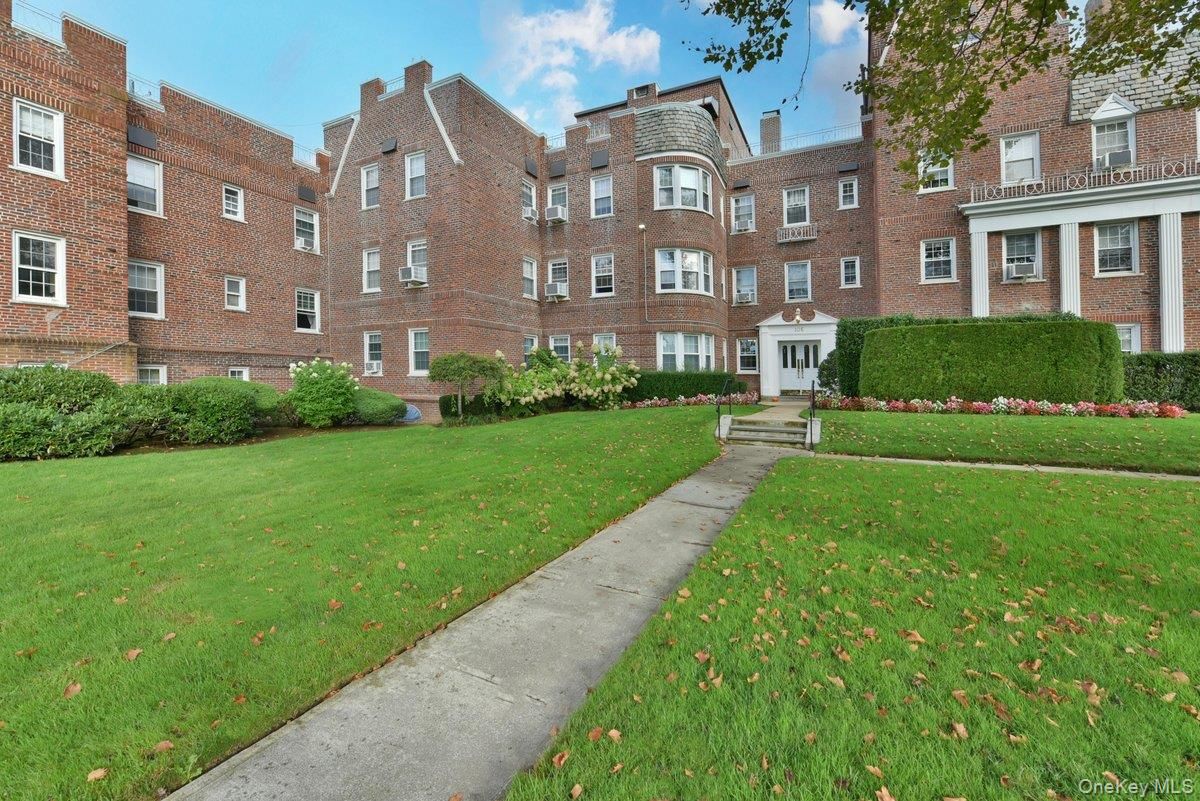 Exterior, Facade, Brick Facade, Condo Building